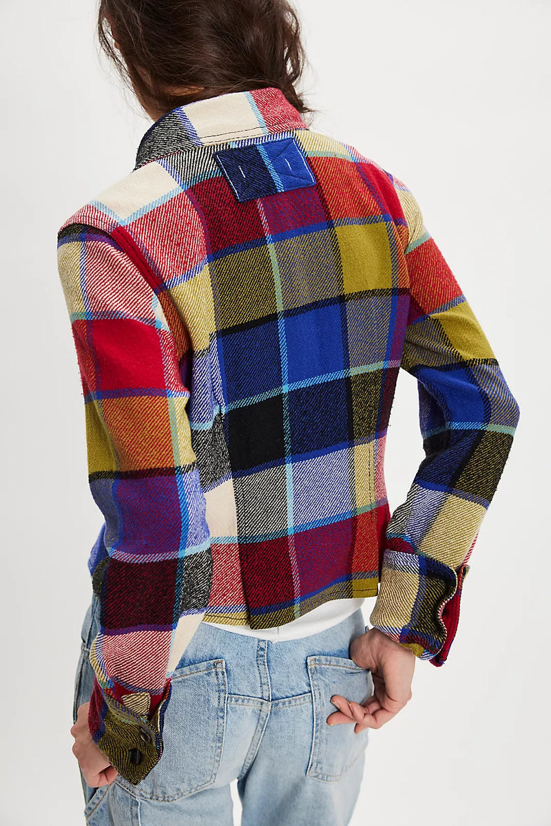 Multicolored Free People plaid shirt worn by a person on a white background