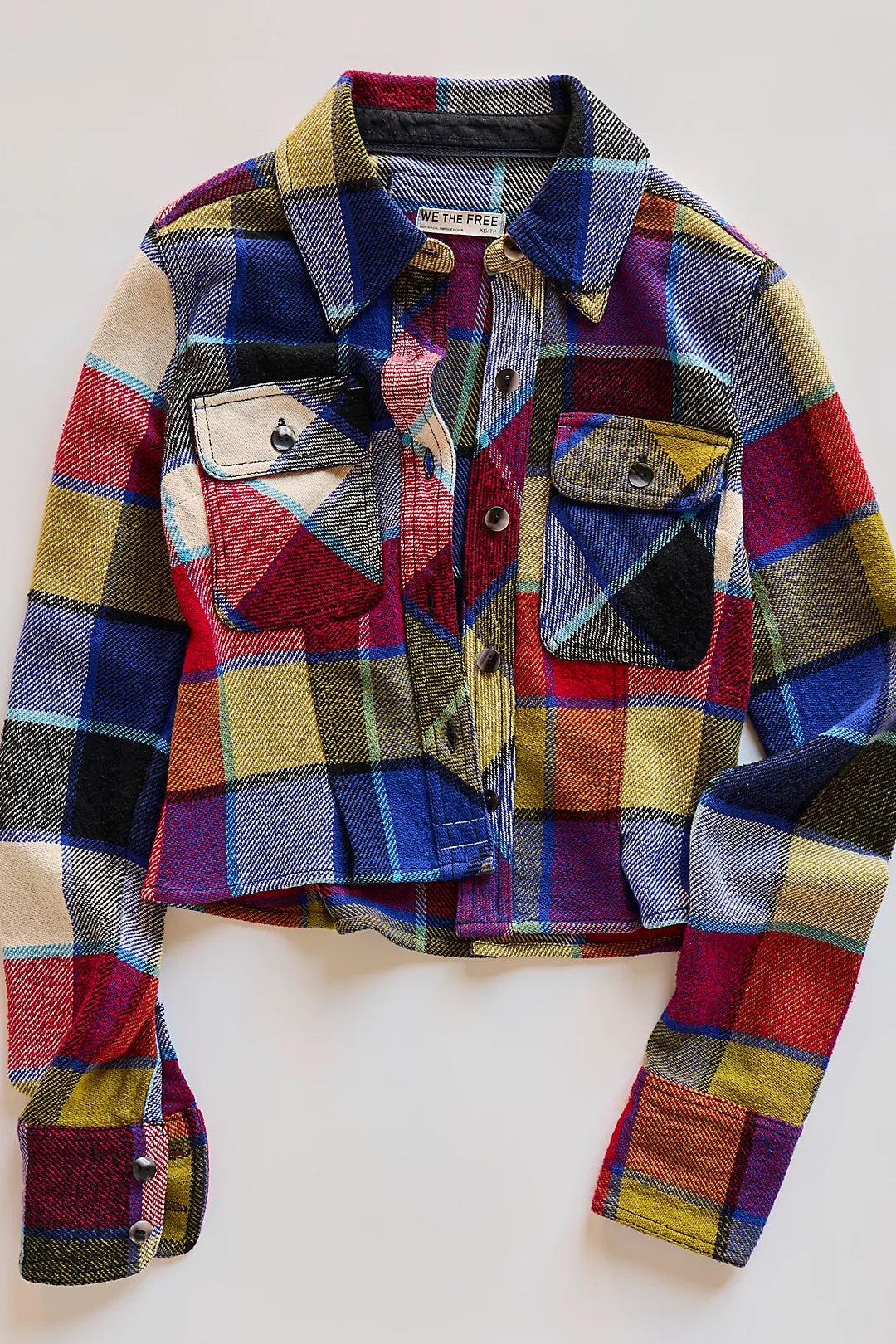 Colorful plaid Free People jacket on a white background