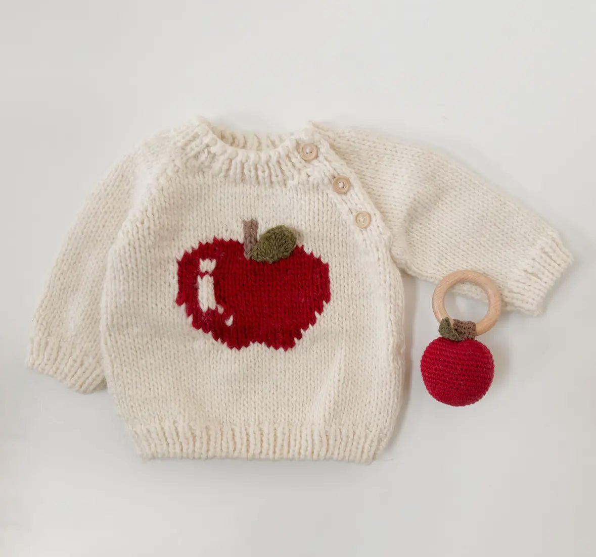 Baby apple pullover knit with buttons from The Blueberry Hill. 