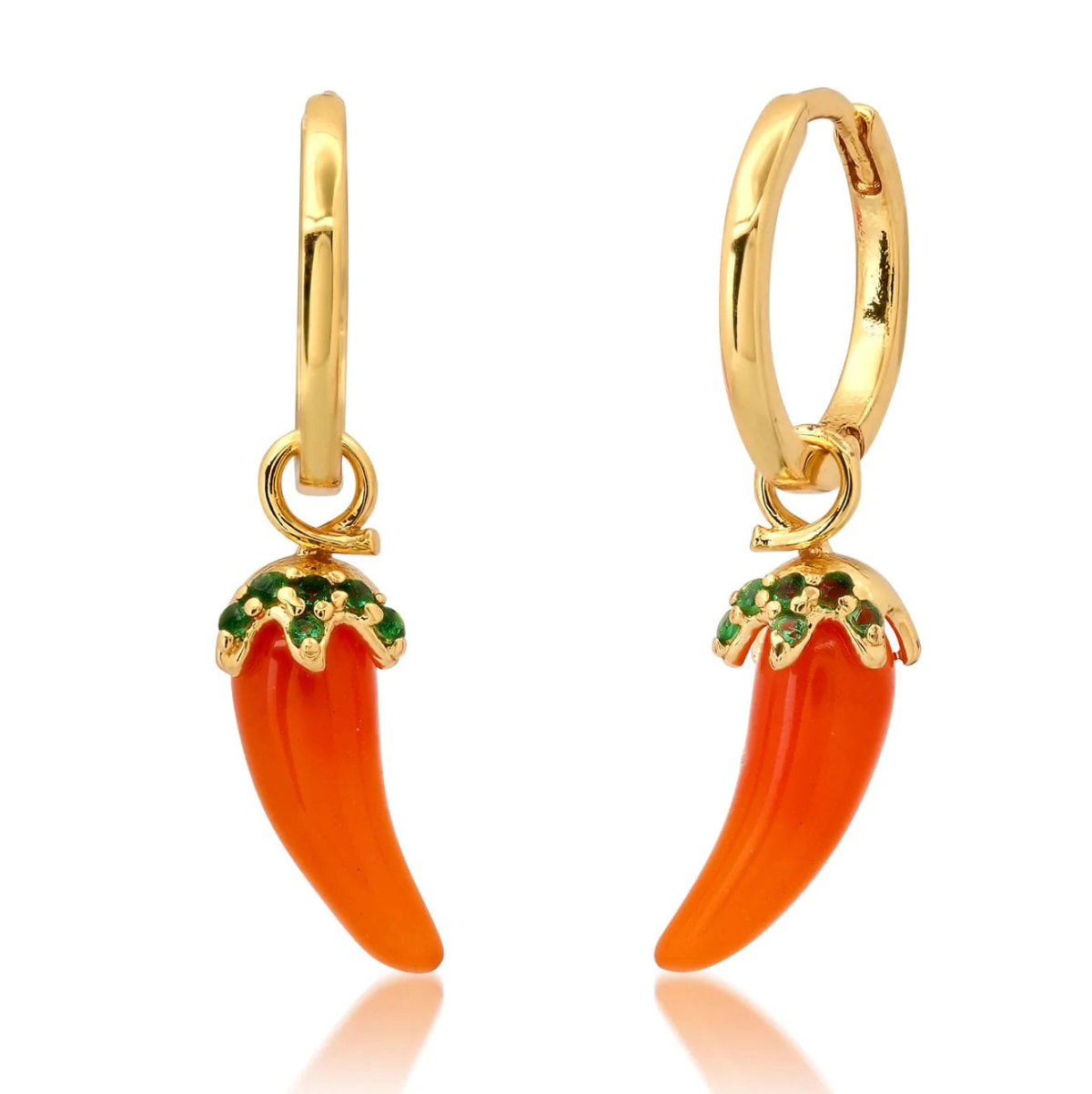 Gold hoop earrings with orange chili pepper charms on a white background