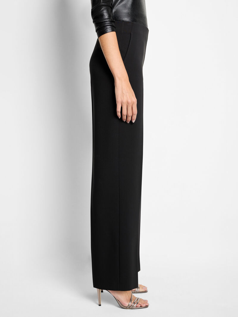Black wide-leg pants on a light gray background