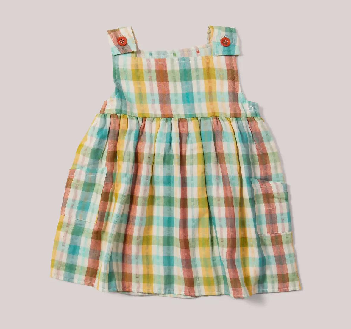 Colorful plaid dress on a light gray background