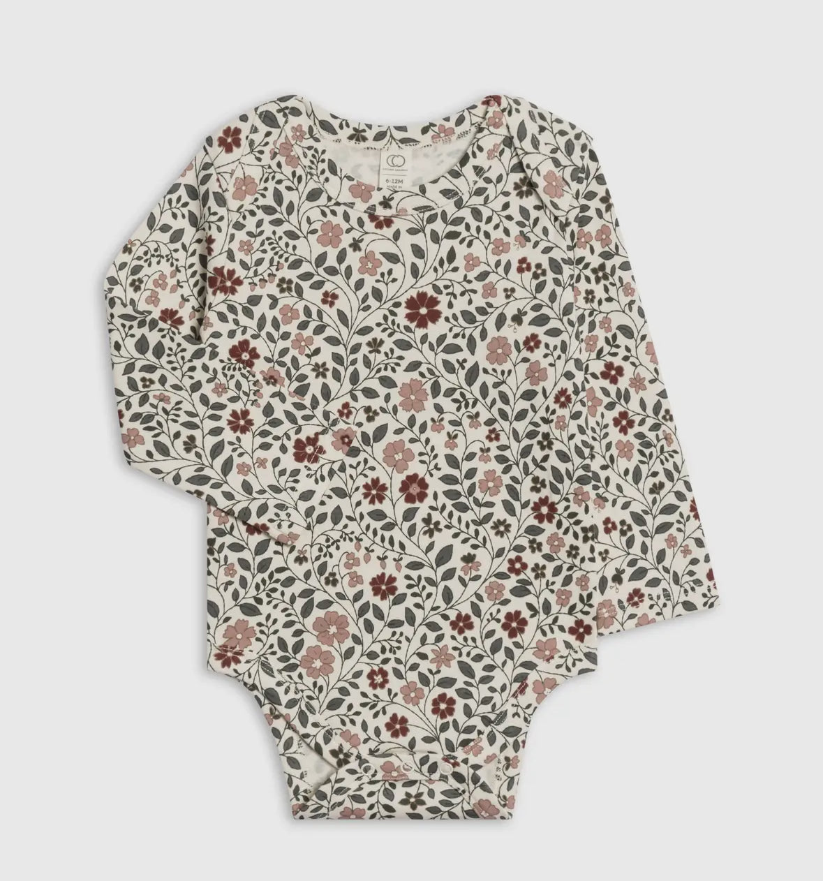 Floral patterned baby onesie on a light gray background