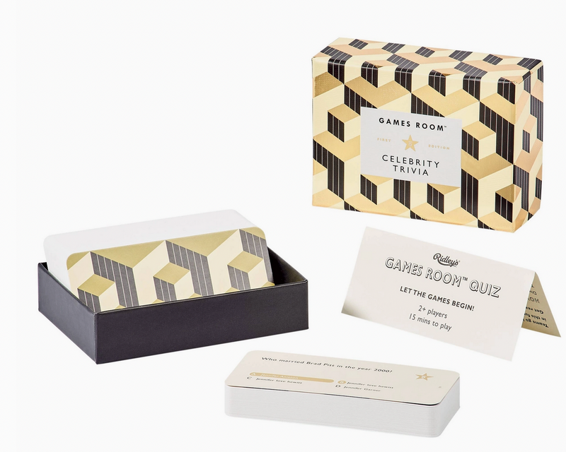 Set of trivia cards with geometric design packaging on a white background