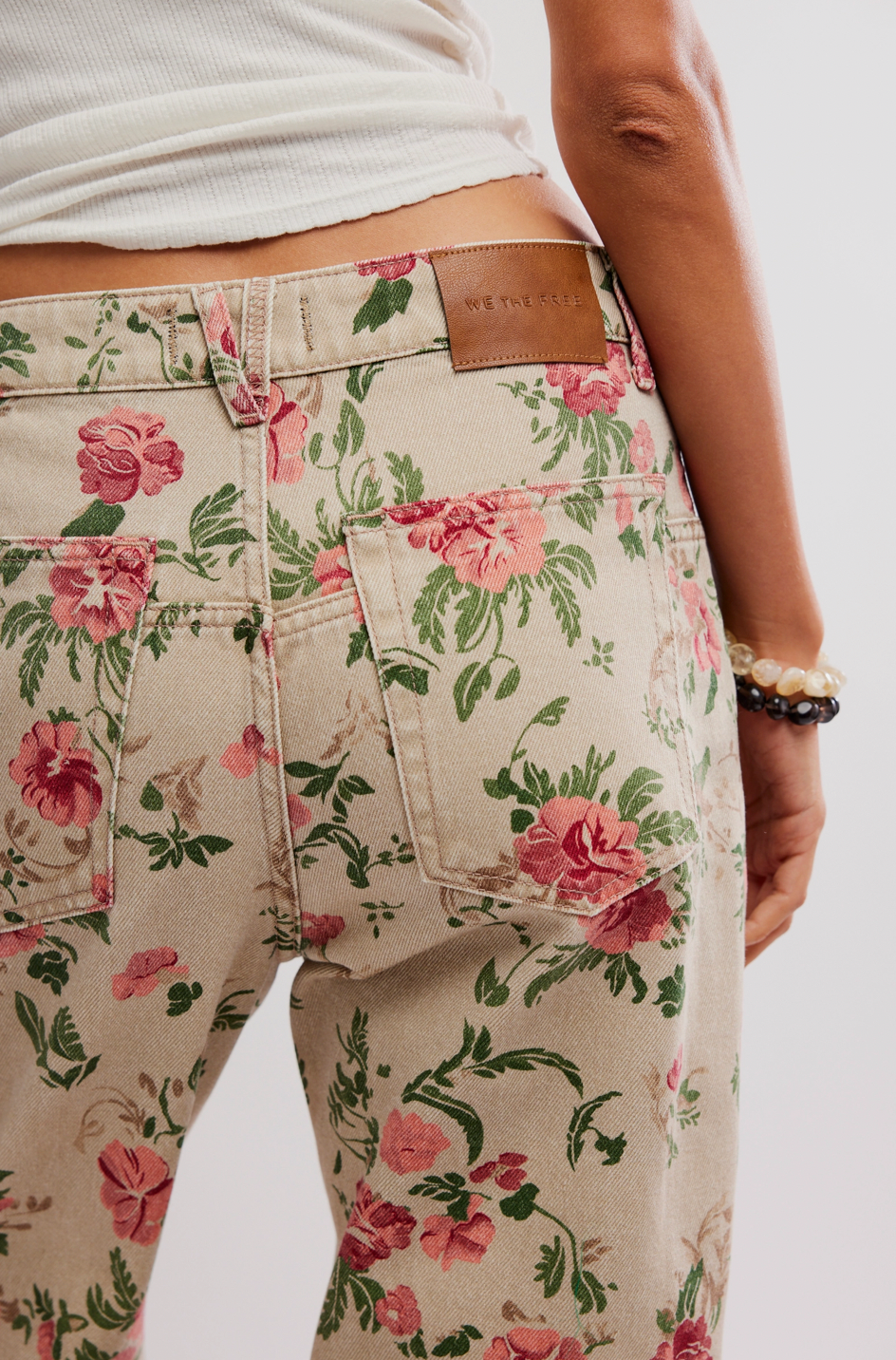 Floral patterned pants with a plain background