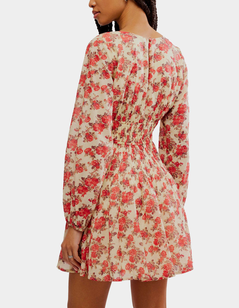 Floral dress with red flowers on a beige background