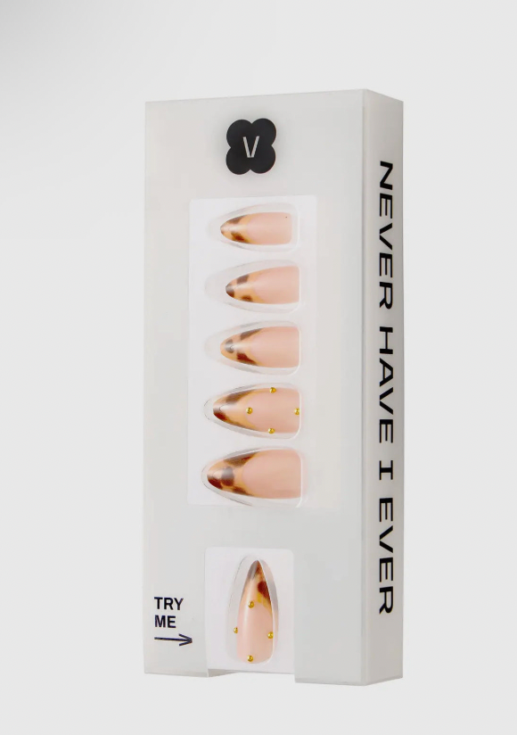 Box of false nails with 'Never Have I Ever' branding on a white background