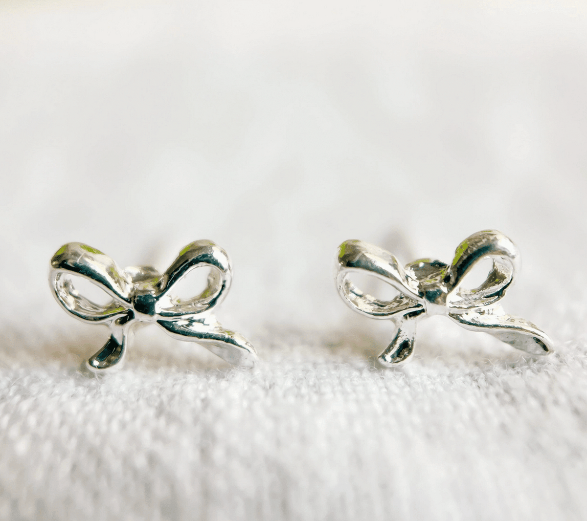 Mini Silver Bow Studs - Flea Boutiques