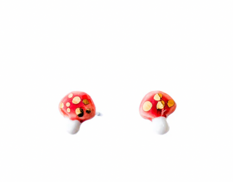 Pair of mushroom-shaped earrings on a white background