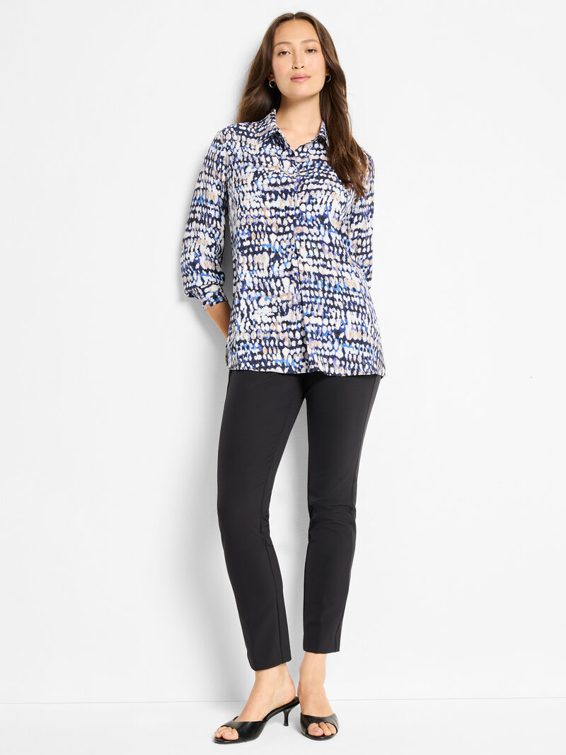 Woman wearing a patterned shirt 