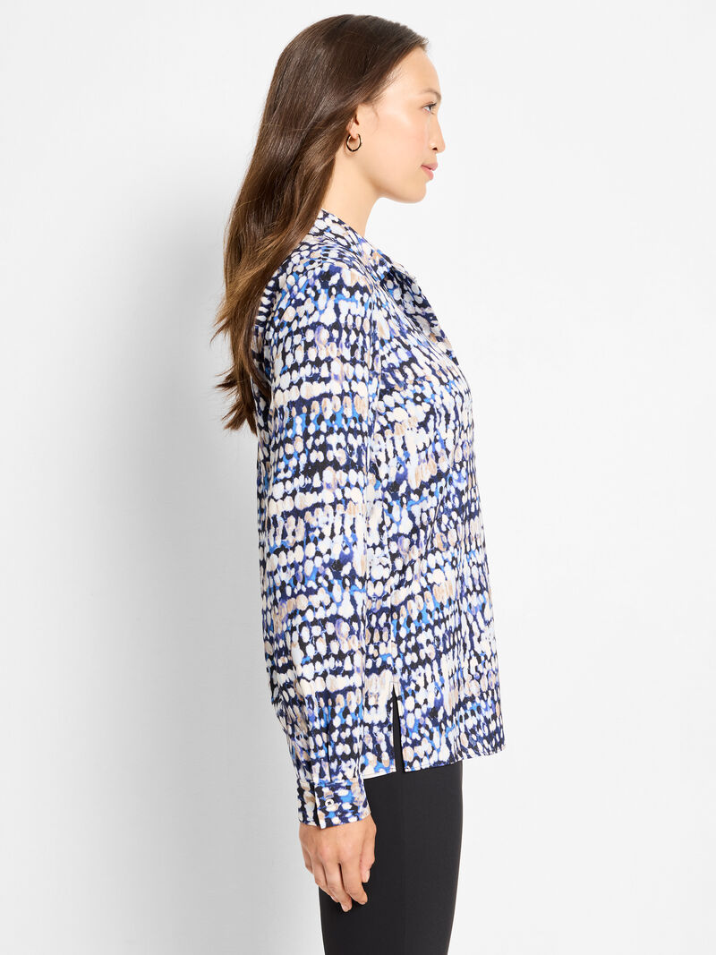 Woman wearing a patterned shirt 