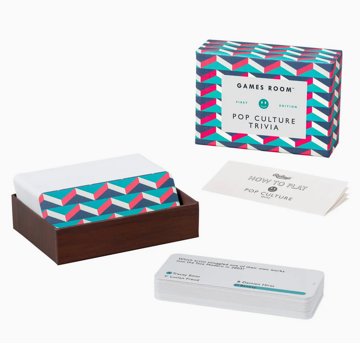 Pop culture trivia game set with colorful packaging on a white background