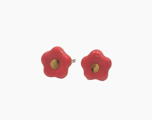 Red flower-shaped earrings with gold centers 