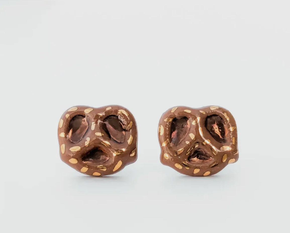 pretzel earrings on a white background