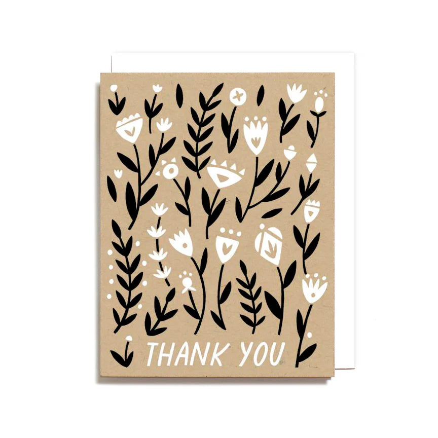 Kraft paper card with black and white floral patterns and 'Thank You' text on a white background